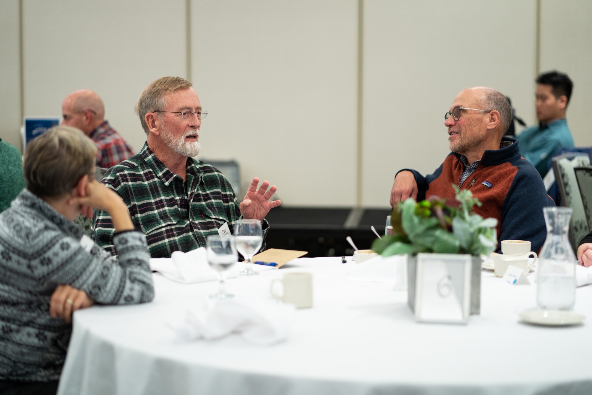 people talking at table